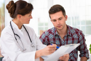 Patient seeing a doctor after Auto Accident | One Law Group